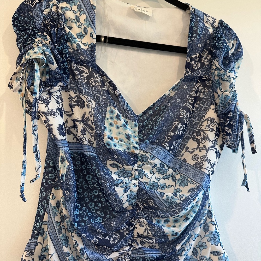 Elegant Blue and White Floral Blouse
